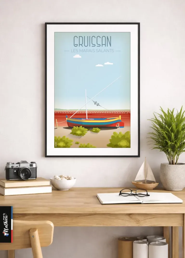Poster des Salins de Gruissan encadré sur bureau avec plantes